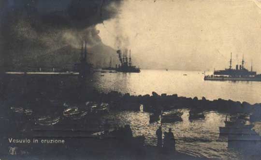 Warships at anchor off Naples during an eruption. From a postcard.